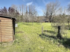 Fermette à Changé 4 000m2 avec grande dépendance