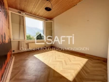 Rare, dans un cadre champêtre, sur 1660 m² de terrain, maison avec magnifique vue sur les montagnes