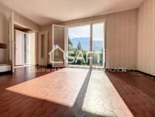 Rare, dans un cadre champêtre, sur 1660 m² de terrain, maison avec magnifique vue sur les montagnes