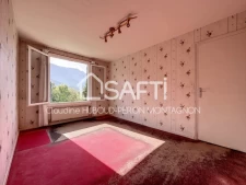 Rare, dans un cadre champêtre, sur 1660 m² de terrain, maison avec magnifique vue sur les montagnes