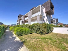 Appartement moderne de 66 m² à vendre à Coublevie avec grande terrasse et garage possible.