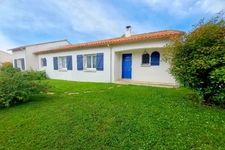 Grand plain pied dans un environnement paisible et résidenti