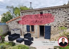 Maison 2 chambres + mezzanine + 60m2 de hangar