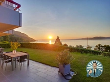 Appartement rez-de-jardin T5 de 130m2  vue lac et montagne à 1