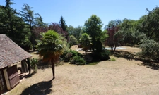 Belle longère sur une propriété de 2.7 ha boisés. 