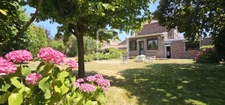 Maison 6 pièces de 132 m2 avec jardin et, garages et dépenda 1