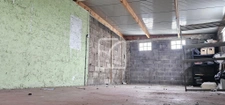 Immeuble dont hangar et garages de 216 m2 sur terrain de 570 5
