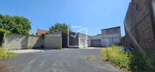 Immeuble dont hangar et garages de 216 m2 sur terrain de 570 1