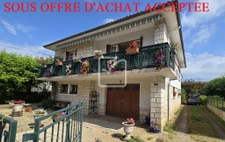 Maison individuelle avec atelier sur 500m2 de terrain clos. 1