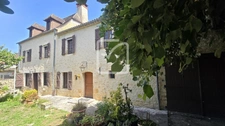 Belle bâtisse en pierre, au calme avec un fort potentiel 1