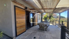 Vue dégagée, terrasse XXL et terrain constructible : un bien 4