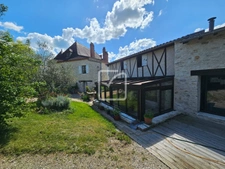 ensemble immobilier en pierre comprenant 2 maisons sur plus  1