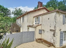 Rare et unique : Ancien moulin de caractère niché dans une f
