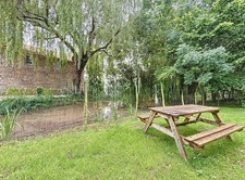 Rare et unique : Ancien moulin de caractère niché dans une f