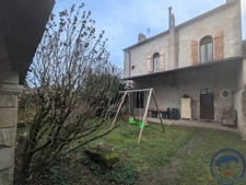 Maison de ville avec jardin, garage - 3 chambres et combles 