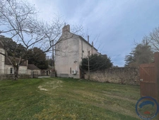 Maison de ville avec jardin, garage - 3 chambres et combles 