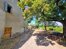 Maison de village à rénover avec box et terrain constructibl