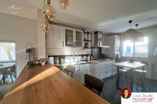 Maison familiale de 120 m2 avec 4 chambres, jardin et garage