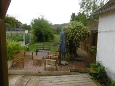 maison de bourg 2 chambres cour jardin de 300 m2 dépendances