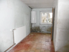 A restaurer longère en centre de village 300 m2 de terrain a