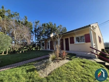 Maison sur sous-sol avec grand terrain arboré