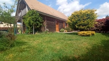  Maison bois avec joli terrain