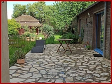 Vaste maison de bourg, 4 chambres, très joli jardin