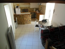 Immeuble Centre de Loué, maison commerce et 3 appartements