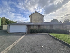 Maison 4 chambres avec sous-sol, hangar et jardin 