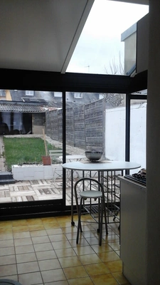 Maison proche commerces et tram