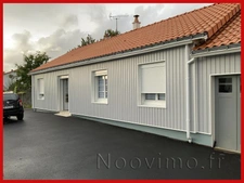 Maison de plain-pied avec jardin et véranda à 2 pas du centr