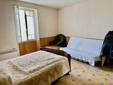 Maison avec grand potentiel et beau jardin