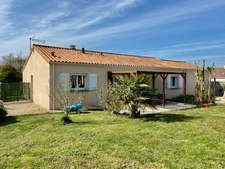 Maison de plain-pied de 106m2 avec garage et terrasse