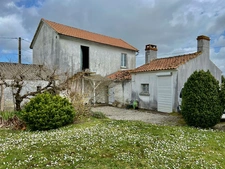Maison avec grand potentiel et beau jardin