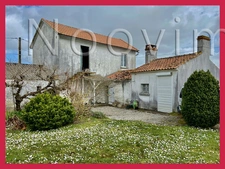 Maison avec grand potentiel et beau jardin