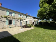 À vendre   Maison en pierre avec grange, jardin et garage-Ch