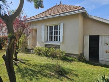 Nantes La Perverie, maison avec un garage et jardin.
