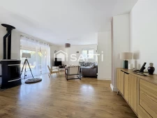 Une maison, chaleureuse, confortable et fonctionnelle