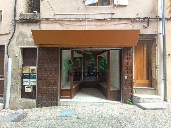 Appartement avec local commercial dans le centre ville d'Aub