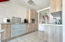 Duplex lumineux avec balcon et ascenseur à proximité immédia