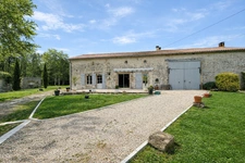 In a peaceful village, this beautiful and spacious 4-bedroom