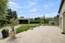 In a peaceful village, this beautiful and spacious 4-bedroom