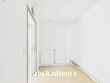 À Gennevilliers, maison familiale avec jardin, terrasse, garage et 4 chambres, à proximité du RER C et du tram T1.