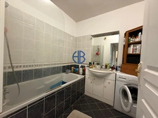 Appartement T3 en rez-de-jardin clos avec parking et cave