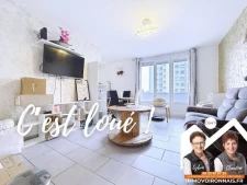 Appartement traversant avec balcon et stationnement privatif...