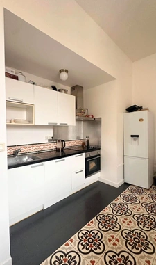 appartement + combles+ cave + place parking