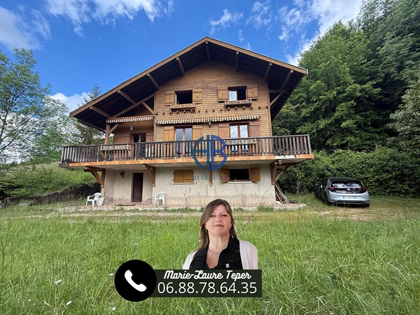 Chalet  de 113 m2 + sous-sol sur 7500m2 de terrain.
