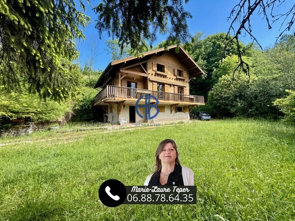 Chalet  de 113 m2 + sous-sol sur 7500m2 de terrain.