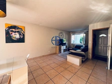 maison mitoyenne sur deux niveaux avec terrain