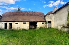 Maison de caractère dans un corps de ferme avec potentiel in